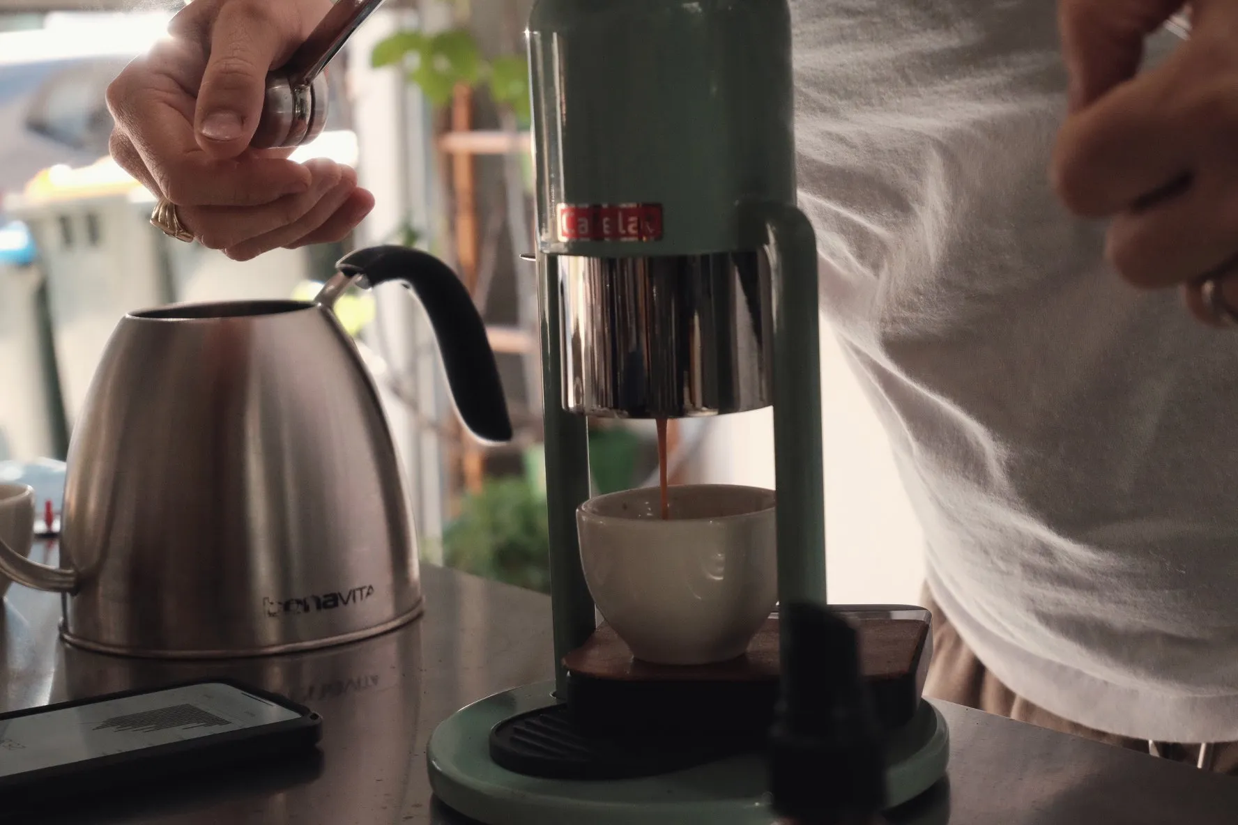 Pulling a shot on a manual lever espresso machine