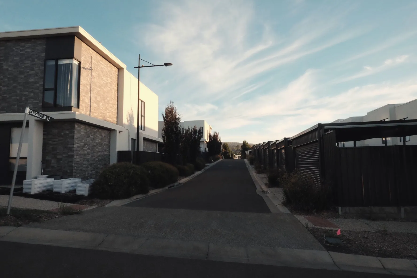 A quiet suburban street at dusk
